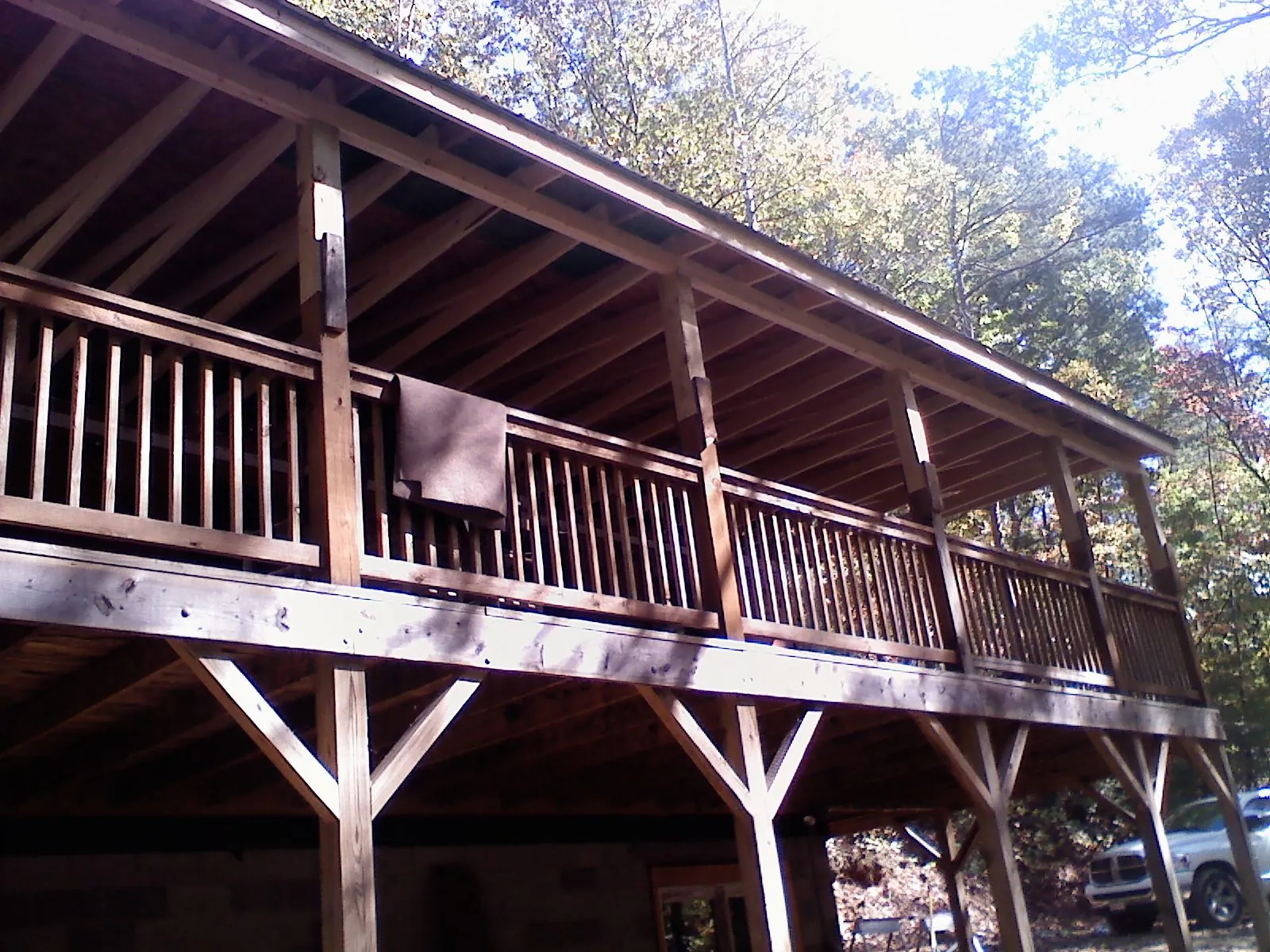 Timber framing under a new elevated porch and deck — Roof Leak Repair in West Augusta by Roofing Brothers
